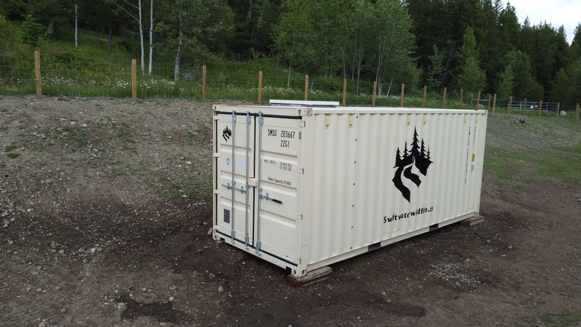 SMS on site with forest behind